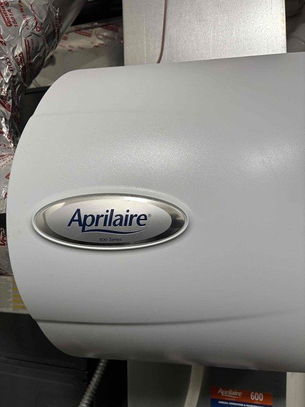 Completed routine heating maintenance on customer's system which includes a boiler, HRV, gas fireplace, and Aprilaire 600 Series humidifier. Inspected all components for proper operation and replaced the humidifier filter pad as part of the scheduled service. Customer was not present during visit; left voicemail and text message to reschedule remaining portions of maintenance.