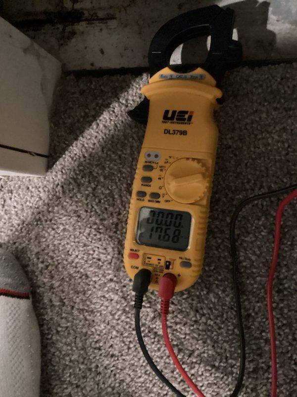 Diagnosed furnace failure caused by faulty igniter as confirmed with digital clamp meter testing. Removed access panel, replaced defective igniter component, and verified proper ignition sequence and system operation before completing service.