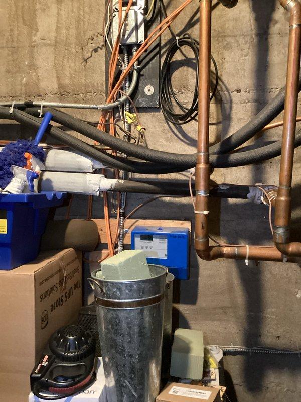 Inspected boiler system with reported intermittent zone control issue. Observed Tekmar 260 control panel functioning normally, showing proper temperature readings. Examined zone valves and associated piping; system was operating correctly during service visit with all zones responding properly to thermostat commands. No intervention required as all components were functioning within parameters at time of inspection.