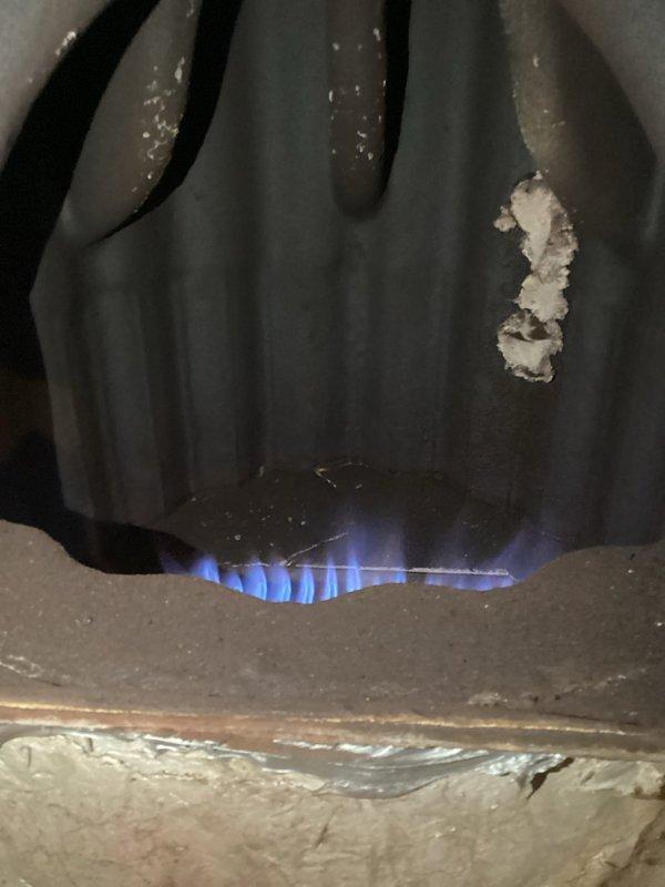 Performed scheduled Fall maintenance on customer's boiler system. Conducted visual inspection of burner assembly, confirming proper flame pattern with consistent blue coloration indicating complete combustion. Checked pipe insulation and valve functionality throughout the system, noting all components in satisfactory operating condition.