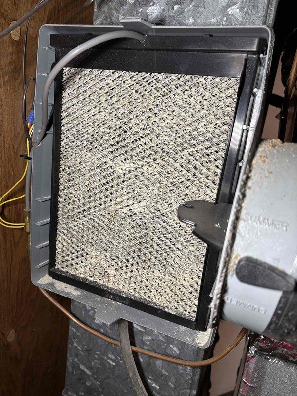Performed scheduled heating maintenance on system and identified a failed capacitor, which was replaced. Inspected humidifier system, cleaned evaporator pad assembly, and confirmed unit is functioning correctly for the heating season.