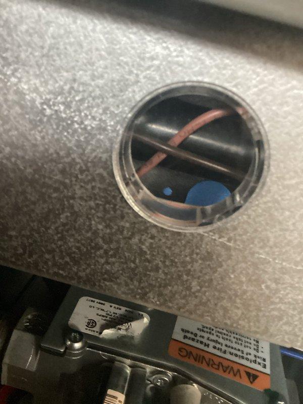 Performed diagnostic service on furnace and heat pump system installed in November. Conducted system tests with UEi EM720 instrument to verify proper operation parameters. Investigated customer concerns regarding noise, thermostat ambient lockout issues, odor during operation, and heating sequence between furnace and heat pump. Inspected internal components including refrigerant lines and warning indicators. No operational deficiencies found during tune-up service.