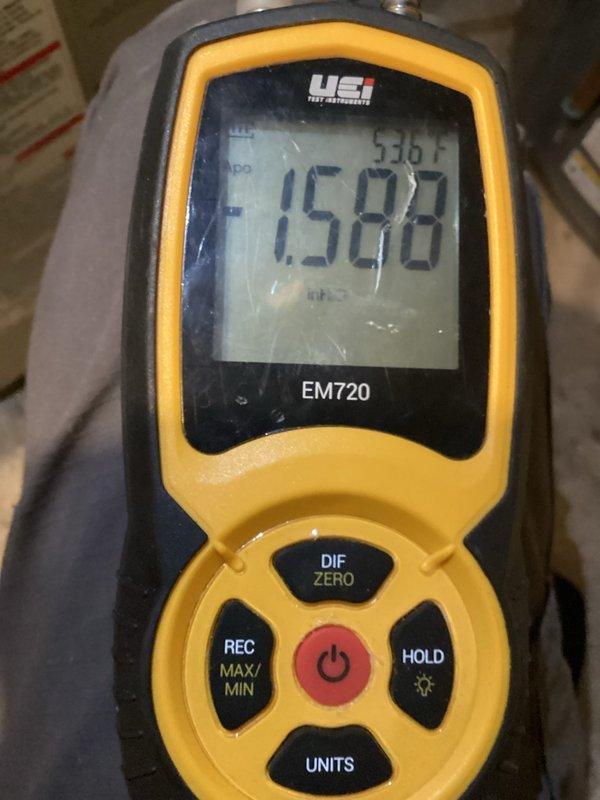 Responded to customer complaint regarding heating system failure and suspected thermostat issues. Performed diagnostic evaluation using Taylor digital thermometer and UEi EM720 meter, revealing extremely low temperature readings (12.4°F) at refrigerant lines with visible frost accumulation. System inspection complete with no repairs required during this preventative maintenance visit.