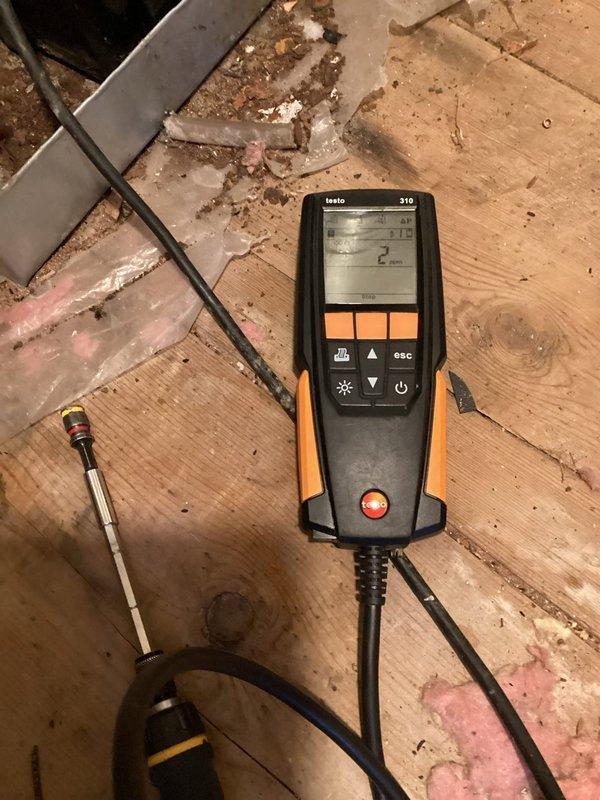 Responded to service call regarding CO concerns in attic master bedroom conversion. Inspection revealed significant rust deterioration in furnace venting system, with complete penetration in one area. Performed diagnostic testing using Testo 310 analyzer to confirm safe operation. Repaired compromised venting to restore proper exhaust flow and eliminate potential carbon monoxide hazards.