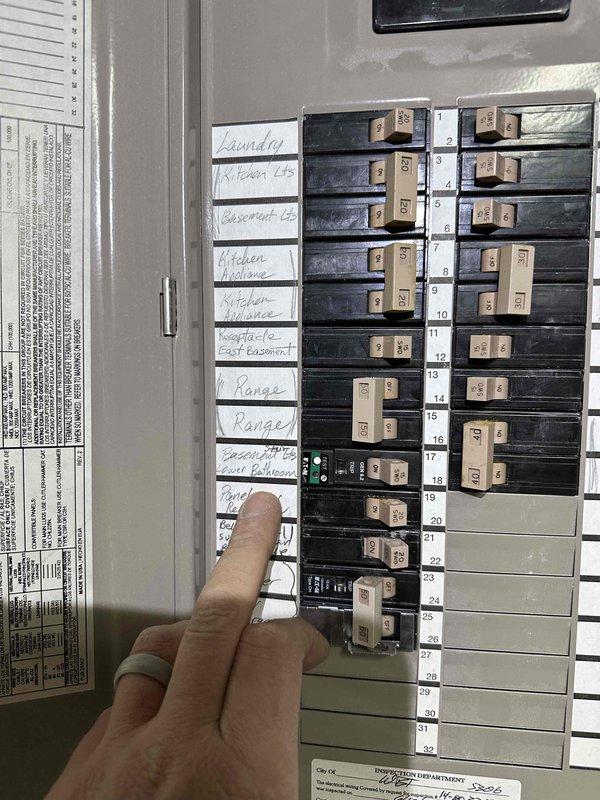 Successfully installed five customer-supplied light fixtures in the basement area, connecting them to existing wiring from the basement stairwell fixture. Provided and installed AFCI/GFCI protection along with a white toggle dimmer switch for controlling the new basement lighting system. Removed old fixtures and installed round blank covers where required.