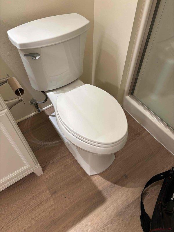 Removed existing toilet and replaced with new unit. Properly installed toilet with wax ring seal on existing flange. Confirmed water supply connection with no leaks and verified proper flushing operation.