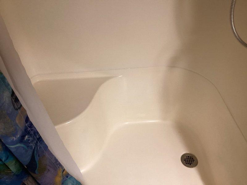 Completed prepaid PA visit as scheduled. Performed preventive maintenance inspection and identified two issues: toilet leaking with deteriorated wax ring and shower surround with separating caulking. Removed toilet, replaced wax ring, reset toilet properly, and applied new caulking to shower surround to prevent water intrusion.