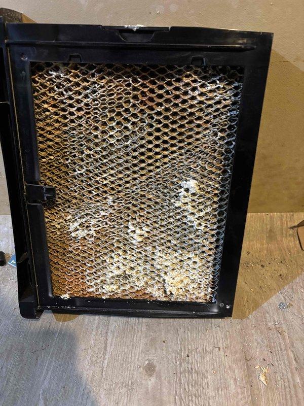 Performed scheduled heating tune-up on customer's HVAC system, which included maintenance on one furnace, one in-floor heat boiler, one humidifier, one HRV (Heat Recovery Ventilator), and one GFP. Cleaned and serviced the Clean Comfort Indoor Air Quality system, replacing severely clogged filter that showed significant dust and debris accumulation to restore proper system function and air quality.