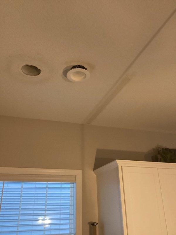 Responded to water damage complaint originating from 2nd floor bathroom shower. Inspection revealed dried out drain gasket and dropped drain pipe as the source of the leak. Accessed area through ceiling, replaced the compromised gasket, and secured pipe with strapping to prevent future movement and potential leakage issues.