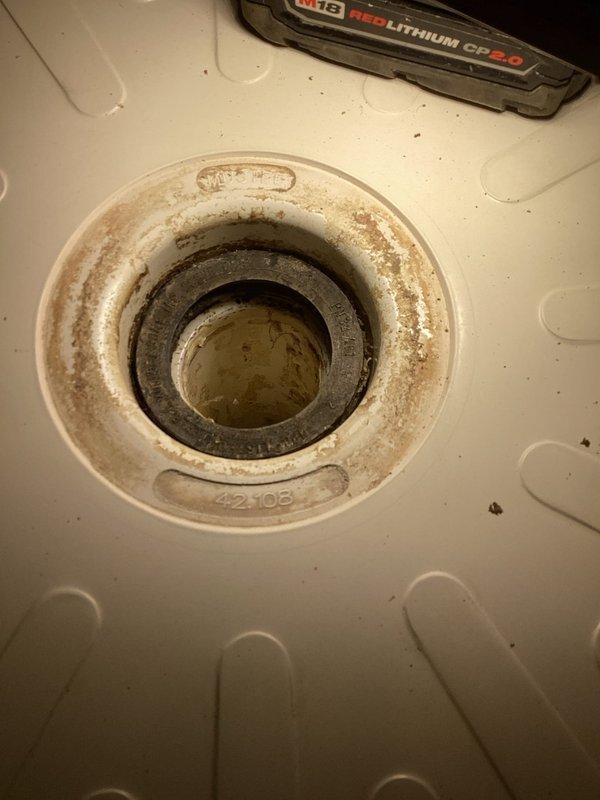 Responded to water damage complaint originating from 2nd floor bathroom shower. Inspection revealed dried out drain gasket and dropped drain pipe as the source of the leak. Accessed area through ceiling, replaced the compromised gasket, and secured pipe with strapping to prevent future movement and potential leakage issues.