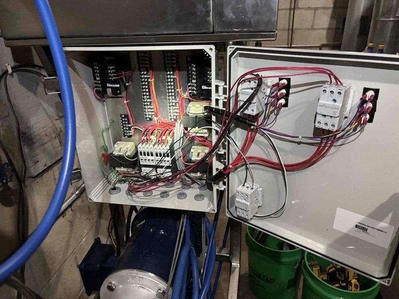 Completed electrical wiring service for parking garage car wash pump replacement. Connected the existing pumps to junction box and control panel, ensuring proper wiring of all electrical components through the conduit system. Verified functionality of the installation after completion.