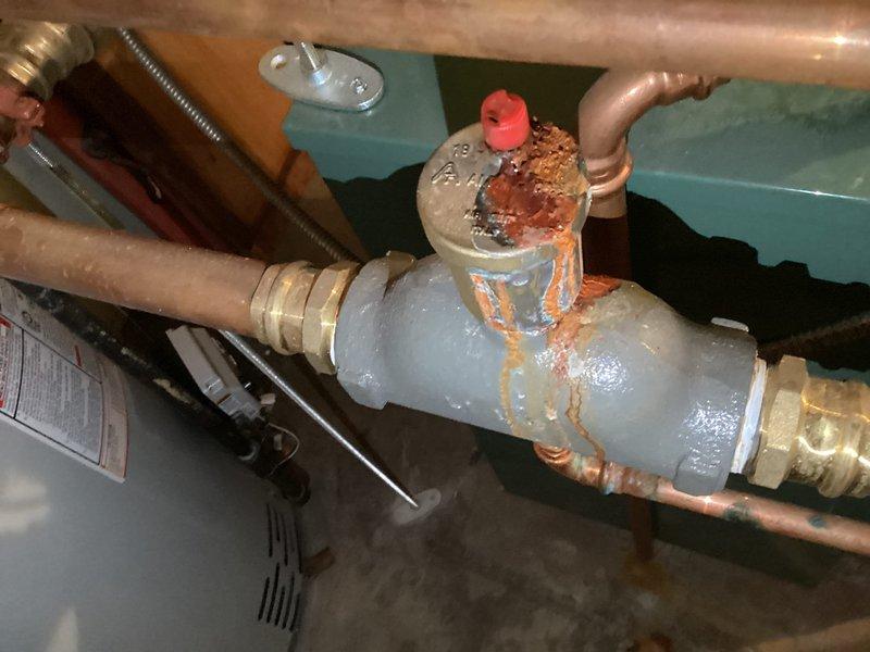 Responded to high pressure concerns in boiler system (25 psi) with observed water discharge from pressure relief valve. Inspection revealed corroded pressure relief valve and compromised Amtrol expansion tank. Diagnosed system overheating issues affecting upper floor temperature regulation. Provided customer with comprehensive solution recommendations including expansion tank replacement, air separator installation, and possible thermostat upgrade to resolve pressure fluctuations and improve temperature control.