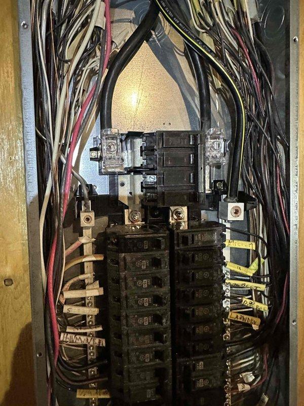 Completed interior panel swap of 200A 40-space GE electrical panel. Removed existing panel internals and installed new components from same manufacturer while preserving and reusing all original circuit breakers. Service included reorganizing and reconnecting existing wiring to restore functionality. No inspection required as work constituted minor maintenance.