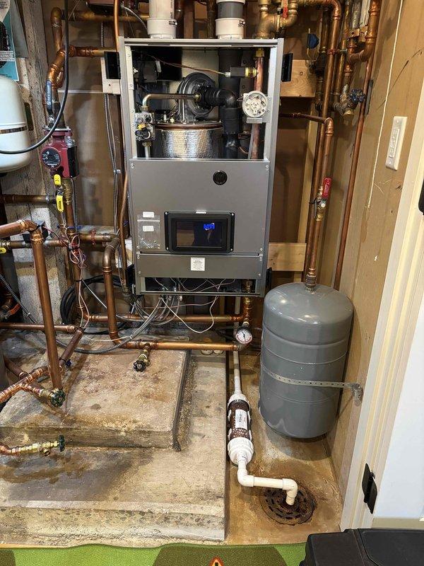 Performed scheduled preventative maintenance on residential heating system consisting of one boiler and one GFP unit. Inspected system components including circulation piping, expansion tank, and water filtration system. All equipment operating within normal parameters with no issues identified.