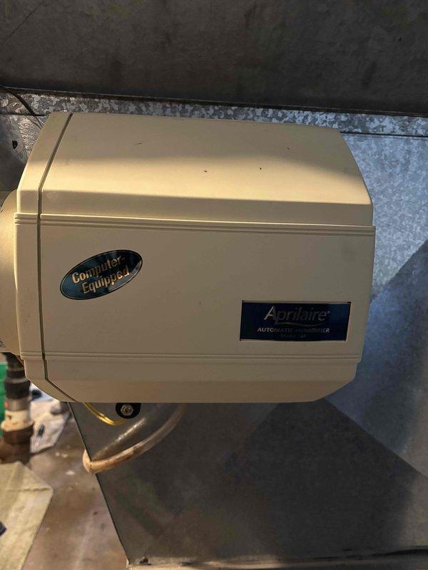 Performed routine heating maintenance on residential system consisting of one furnace and one Aprilaire automatic humidifier. Inspected humidifier components and replaced dirty filter media showing significant dust/debris accumulation. System tested and confirmed operating correctly post-service.