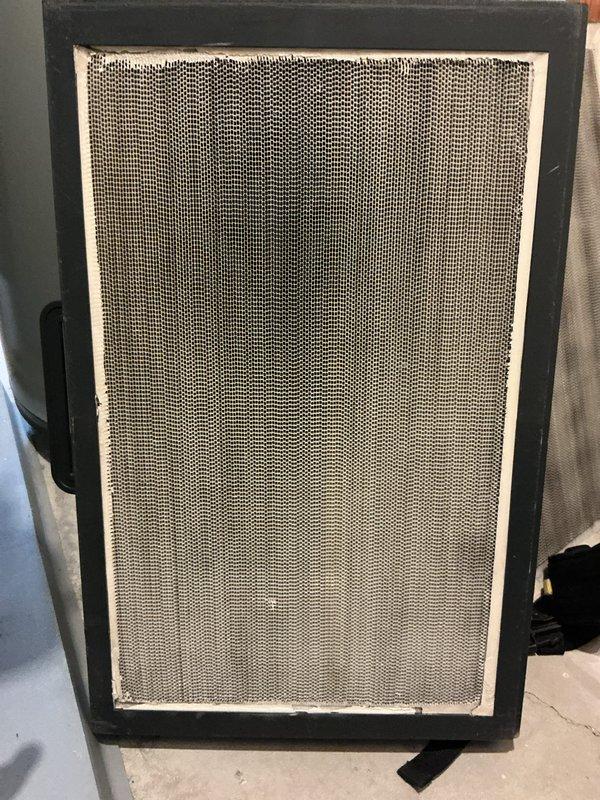 Performed service on HVAC system that was experiencing slow heating response (taking approximately one hour to increase temperature by one degree). Diagnosed restricted airflow to furnace and inoperative pilot light in fireplace. Corrective actions included cleaning heavily soiled air filter and flame sensor to restore proper system operation.