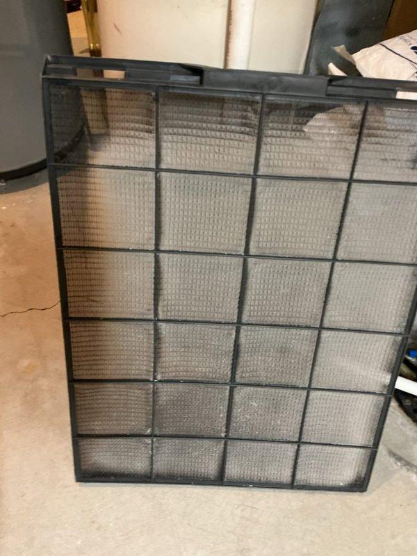 Performed service on HVAC system that was experiencing slow heating response (taking approximately one hour to increase temperature by one degree). Diagnosed restricted airflow to furnace and inoperative pilot light in fireplace. Corrective actions included cleaning heavily soiled air filter and flame sensor to restore proper system operation.