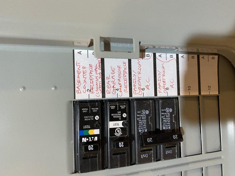 Completed installation of a 60-amp sub-panel in the unfinished basement mechanical room with two 120V 15-amp tandem breakers in the main 150-amp Square D QO panel. Installed whole house surge protector and two 120V GFCI devices in basement. Successfully fished 240V circuit through unfinished areas, terminating in junction box near garage fireplace bump-out with surface-mounted conduit protection to back wall. Hardwired Xcel-supplied EV charger with 60-amp protection for 48-amp output capacity.