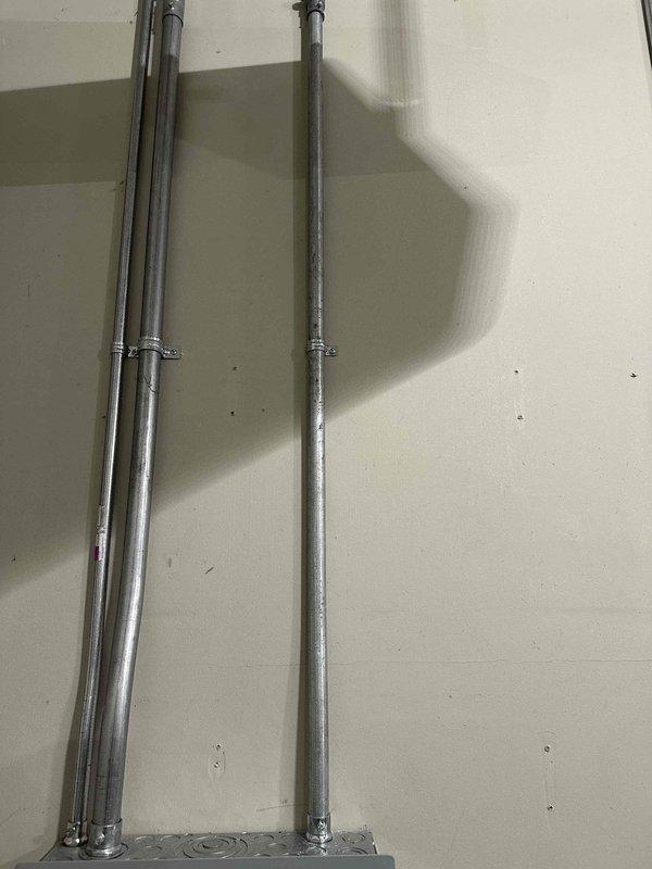 Removed existing 50 amp 14-50 receptacle and associated wiring. Installed new 30 amp 240V dedicated circuit for customer-supplied garage heater. Mounted and connected the heater directly above the 100 amp garage sub panel, with proper metal conduit installation and circuit breaker connection.