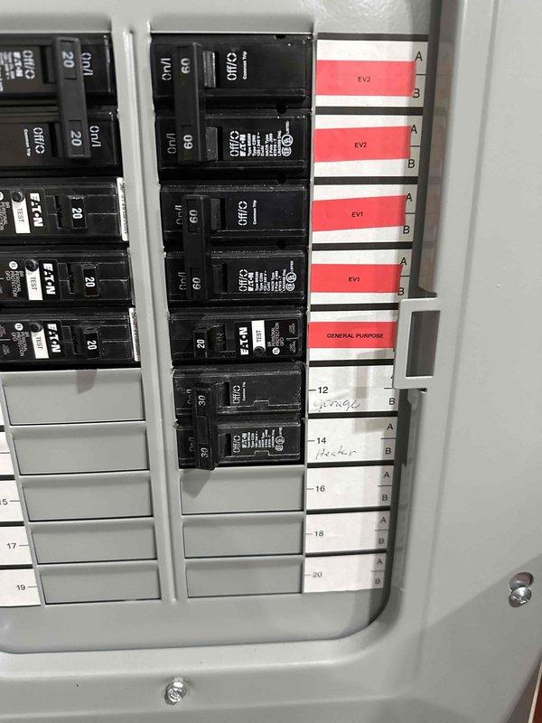 Removed existing 50 amp 14-50 receptacle and associated wiring. Installed new 30 amp 240V dedicated circuit for customer-supplied garage heater. Mounted and connected the heater directly above the 100 amp garage sub panel, with proper metal conduit installation and circuit breaker connection.