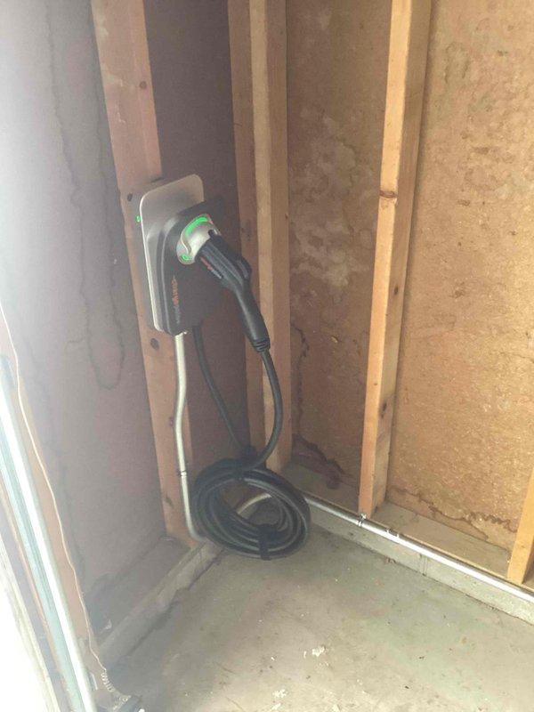 Successfully installed ChargePoint Home Flex charging station for Volkswagen ID.4 (2023) in unfinished garage. Connected to Xcel Energy meter (SN: 000360404287) with proper wiring to 240V service. Verified system functionality and completed setup with customer's ChargePoint app using code AcclathomeMN for PAYG rental service.