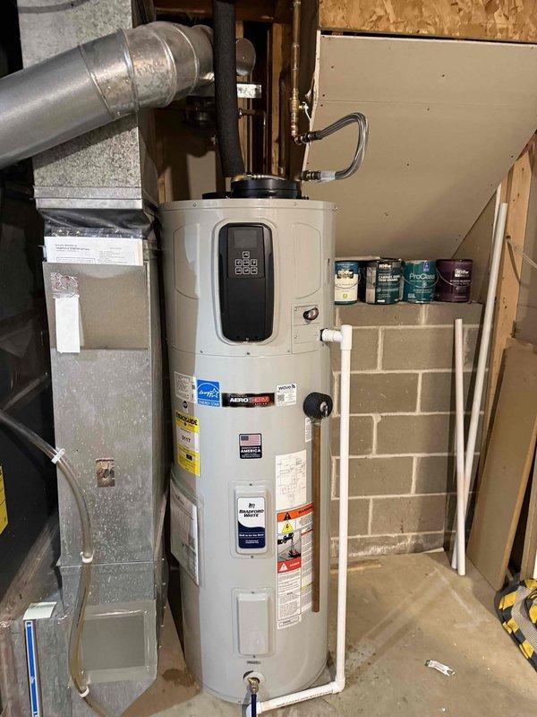Successfully installed a Bradford White 50-Gallon G2 Electric Hybrid Heat Pump Water Heater (M# RE2HP5010-1NCTT) to replace existing atmospheric water heater. Completed necessary panel upgrade, installed new isolated shut off valve, connected water lines, and ran condensate line to floor drain. System tested for proper operation with no leaks present.