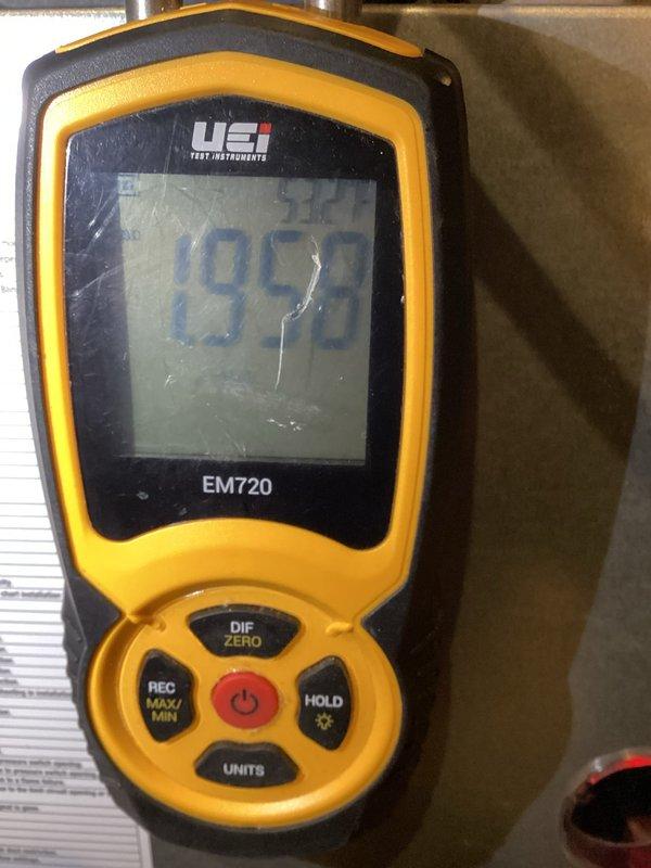 Responded to customer complaint of gas smell near furnace exhaust on recently installed unit. Performed gas pressure testing and found readings out of specification (low: 1.9, high: 3.89). Adjusted high pressure setting to 3.5 WC and conducted combustion analysis with Testo 310 to verify proper operation. Documentation left on-site.