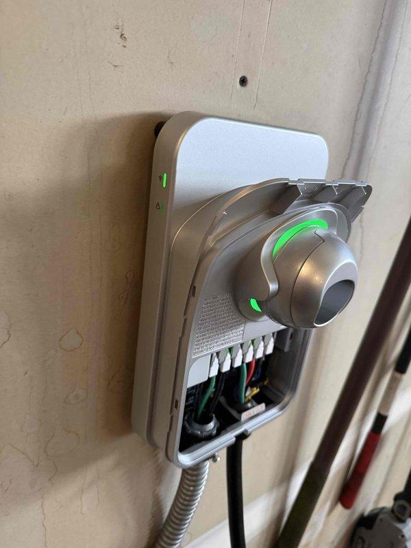 Successfully installed and hardwired a 60-amp EV charging station on the garage wall with surface-mounted conduit for protection, allowing for 48-amp output capability. Completed programming and setup of the charging unit, and installed a dedicated 120V 20-amp tamper-resistant GFCI outlet as specified in the project scope. All work was completed according to specifications and photo documentation was taken of the installation.