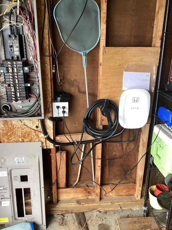 Successfully installed the customer-supplied Emporia EV charger, replacing the previous Enel X Juicebox unit. Added dedicated circuit in main electrical panel with proper labeling for the Honda charging system. Completed final inspection with all connections verified for proper operation and safety compliance. Removed the old Enel X Juicebox unit to be returned to Electrum per instructions.