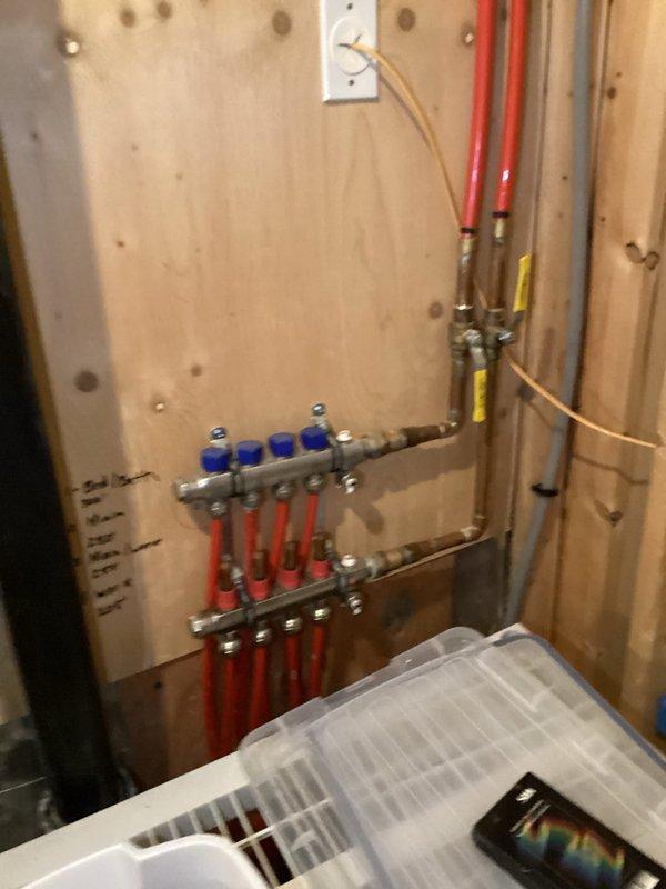 Responded to a no-heat service call for a Triangle Tube boiler system. Upon inspection, determined the Wilo circulation pump had failed, preventing proper circulation to in-floor heating system. Replaced defective pump and verified proper operation of manifold distribution system with all zone valves functioning correctly.