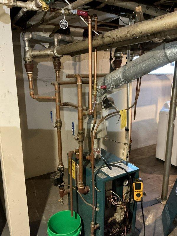 Completed routine preventive maintenance on residential boiler system. Performed comprehensive cleaning, checked all pressure and temperature gauges which were operating within normal parameters. Inspected all copper piping, connections and valves which were found to be in functional condition with no leaks detected.