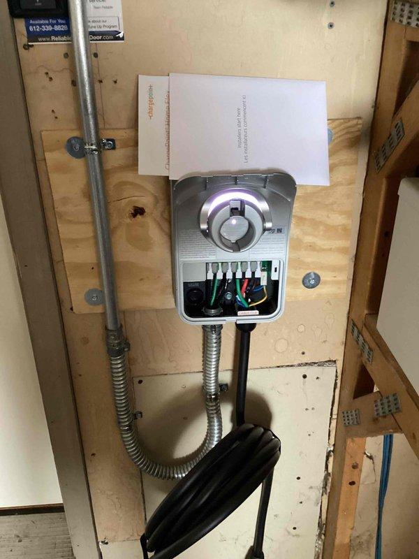 Successfully installed a hardwired 60-amp Xcel-supplied EV charging station with 48-amp output capability along the garage wall. Routed surface-mounted conduit from the 200-amp Siemens electrical panel to the charger location positioned right of the garage entry door. Completed system programming and setup through the ChargePoint app, ensuring proper functionality of the charging station.