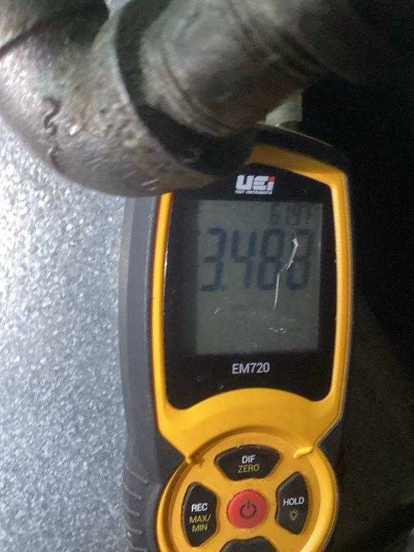 Diagnosed furnace with no heat output due to tripped high limit switch caused by restricted airflow. Temperature readings confirmed inadequate heat transfer (34.9°F at supply and 57°F ambient). Recommended installation of less restrictive air filter to prevent future airflow restrictions and maintain proper furnace operation.