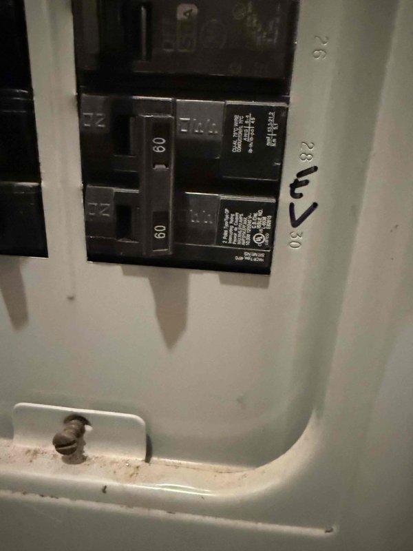 Completed the installation of Electrum supplied Emporia EV charger, replacing the existing Enel X Juicebox as specified. Verified proper electrical connection to the 60A breaker in the main panel and confirmed charging functionality with customer's Honda EV. Documented installation with photographs of completed charger mounting, cable management, and electrical panel connections.