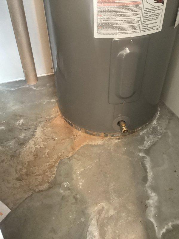 Responded to service call for non-functioning 2020 Rheem Classic water heater. Inspection revealed significant water leakage from tank base creating extensive puddling on concrete floor. Completed assessment and provided customer with replacement recommendation due to tank failure, noting warranty status was verified.