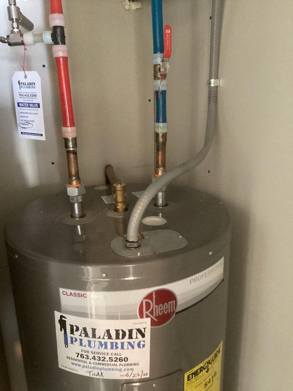 Responded to service call for non-functioning 2020 Rheem Classic water heater. Inspection revealed significant water leakage from tank base creating extensive puddling on concrete floor. Completed assessment and provided customer with replacement recommendation due to tank failure, noting warranty status was verified.