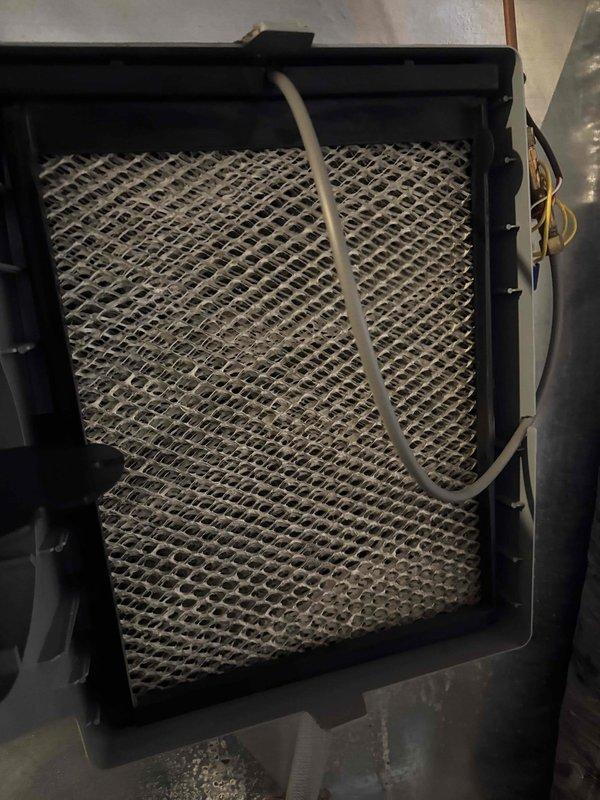 Performed preventative maintenance on 1 furnace and 1 gas fireplace per prepaid agreement. Inspected Aprilaire whole-home humidifier, noting proper installation and switch configuration. Removed and cleaned air filter which showed significant dust accumulation. All systems operating normally after service.