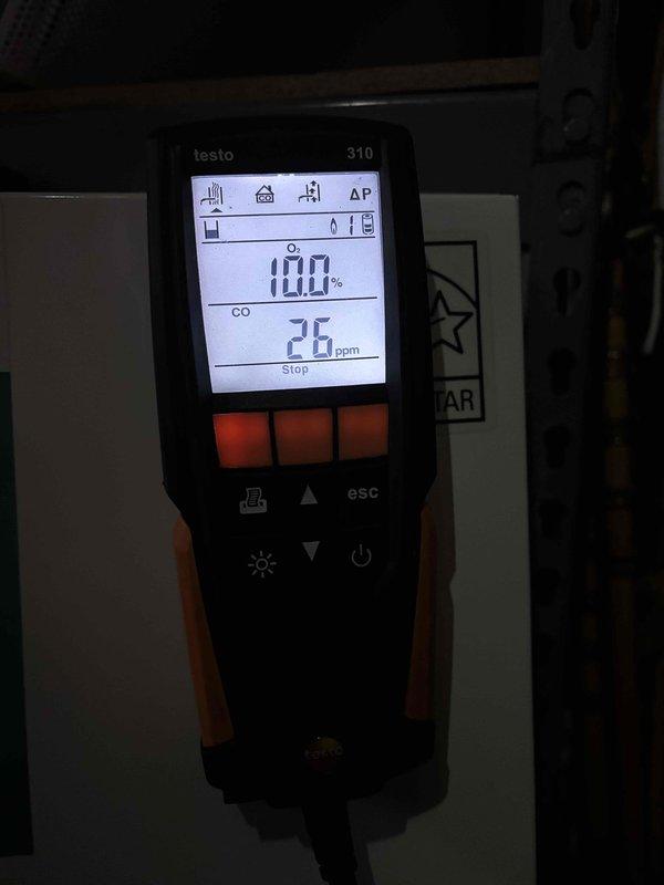 Performed scheduled boiler maintenance service per prepaid agreement. Conducted combustion analysis using Testo 310 analyzer, with readings showing approximately 9.6-10.0% CO2 and 25-26 ppm CO, indicating proper combustion efficiency within acceptable parameters.