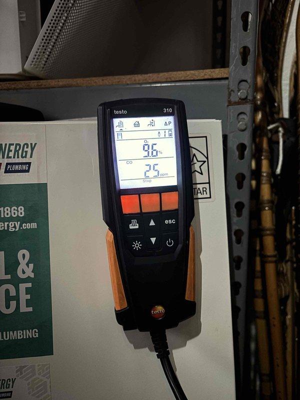 Performed scheduled boiler maintenance service per prepaid agreement. Conducted combustion analysis using Testo 310 analyzer, with readings showing approximately 9.6-10.0% CO2 and 25-26 ppm CO, indicating proper combustion efficiency within acceptable parameters.