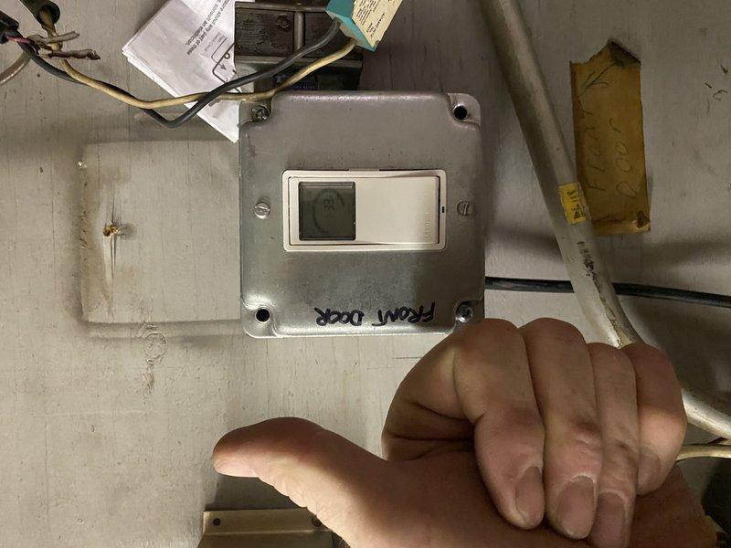 Reconfigured door access control system in outer vestibule by resetting the locking schedule as requested. Troubleshooted and reprogrammed the controller labeled "FRONT DOOR" that was not functioning properly at location 1077. Successfully restored automatic nightly locking functionality to all entrance doors.