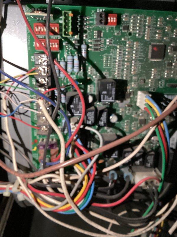 Conducted scheduled preventative maintenance on heating system including 1 furnace and 1 humidifier. Inspected control board and wiring configuration to diagnose issue with air conditioning activating during heating calls. Identified cross-wiring problem in terminal connections requiring circuit board reconfiguration to properly separate cooling and heating functions.