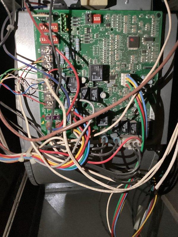 Conducted scheduled preventative maintenance on heating system including 1 furnace and 1 humidifier. Inspected control board and wiring configuration to diagnose issue with air conditioning activating during heating calls. Identified cross-wiring problem in terminal connections requiring circuit board reconfiguration to properly separate cooling and heating functions.