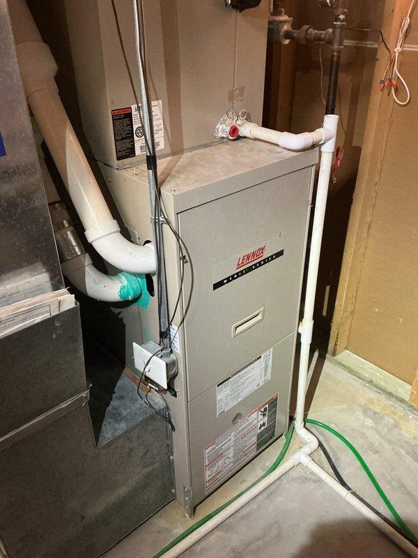 Diagnosed blower motor issue on Lennox furnace causing heating failure and indoor temperature drop to 60°F. Found capacitor severely underperforming at 0.18 (should be 5.0). Replaced faulty capacitor, restoring proper blower motor function and system operation.