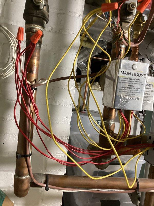 Diagnosed uneven heating issue across radiator system caused by a defective zone head. Inspected plumbing and electrical connections at the main house control panel. Replaced malfunctioning zone head to restore proper heat distribution to all registers.