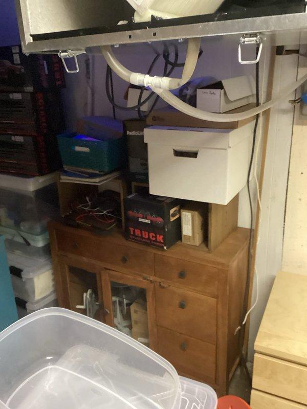 Diagnosed air exchanger in basement furnace room that was leaking and experiencing freezing issues during cold weather. Discovered partially clogged condensate drain line causing water accumulation and dripping from bottom corner. Cleared both the drainage lines and outside air intake to restore proper operation and prevent future freezing/leaking issues.