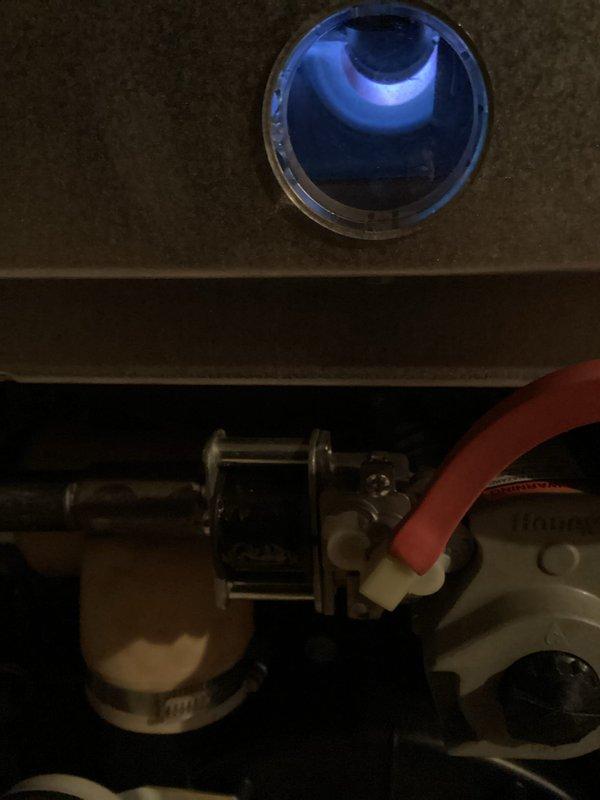 Responded to service call for AC unit that was shaking violently. Diagnostic inspection revealed a blown fuse likely caused by debris in the system. Replaced fuse which resolved the issue. Customer has 8 thermostats all set to heat mode; verified proper operation after repair.