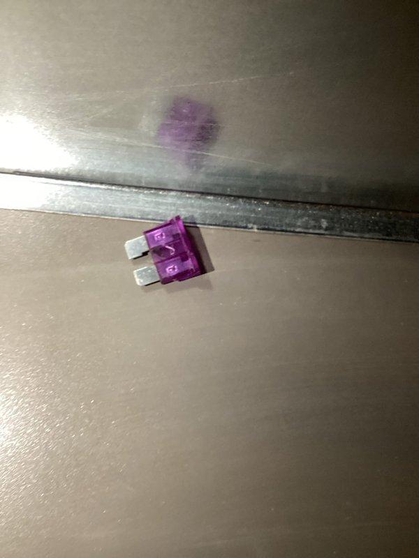 Responded to service call for AC unit that was shaking violently. Diagnostic inspection revealed a blown fuse likely caused by debris in the system. Replaced fuse which resolved the issue. Customer has 8 thermostats all set to heat mode; verified proper operation after repair.