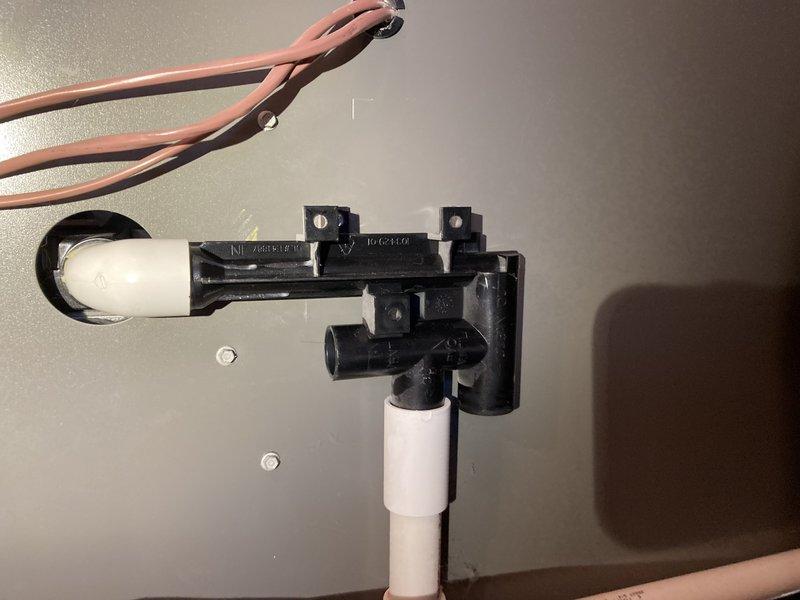 Responded to service call for high-efficiency furnace exhibiting popcorn sound on startup followed by shutdown, water leakage, and ignition error. Diagnosed frozen condensation trap as root cause of system failure. Serviced by thawing condensation trap and verifying proper operation after repair.