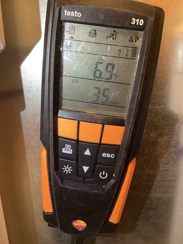Responded to no heat call. Diagnosed issue with tripped roll out switches. Reset switches and verified proper system operation using Testo 310 combustion analyzer. Inspected FASCO motor during service; all components now functioning correctly with restored heat.