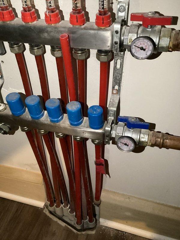 Responded to no heat complaint due to low boiler pressure (1 psi). Diagnosed system, filled boiler to proper operating pressure, and reset system to restore heat. Noted potential leak in infloor manifold that will require follow-up service.